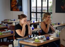 Students enjoy an olive oil tasting in Italy