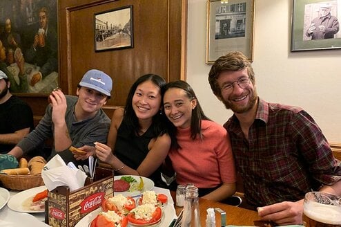 Four CET Prague study abroad students at a restaurant in Prague