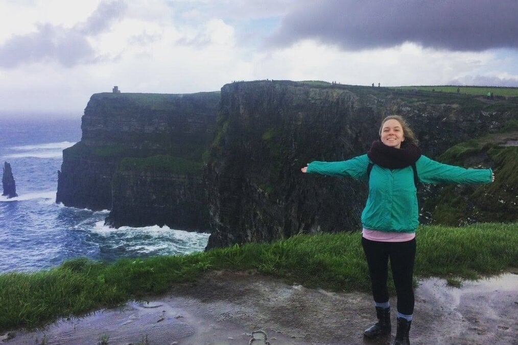 Taylor M., CAPA Dublin Alum A person standing on a cliff near the sea